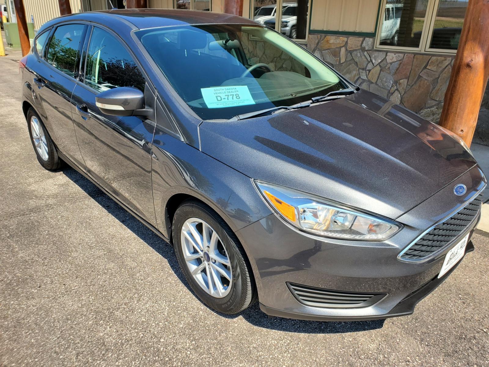 2016 Tan /Black Ford Focus SE (1FADP3F23GL) with an 2.0L 4Cyl GDI TI-VCT engine, 6-Speed Powershift Automatic transmission, located at 1600 E Hwy 44, Rapid City, SD, 57703, (605) 716-7878, 44.070232, -103.171410 - Photo #29